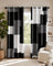 Grey geometric checkered blackout curtains framing a modern living room window