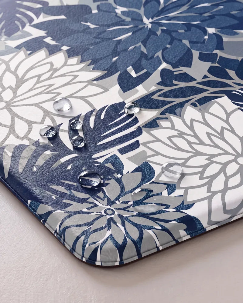 Water droplets on Blue Gray floral anti-fatigue kitchen mat showing its waterproof surface