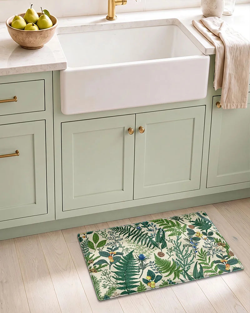 Vintage Beige botanical anti-fatigue mat in front of a farmhouse kitchen sink