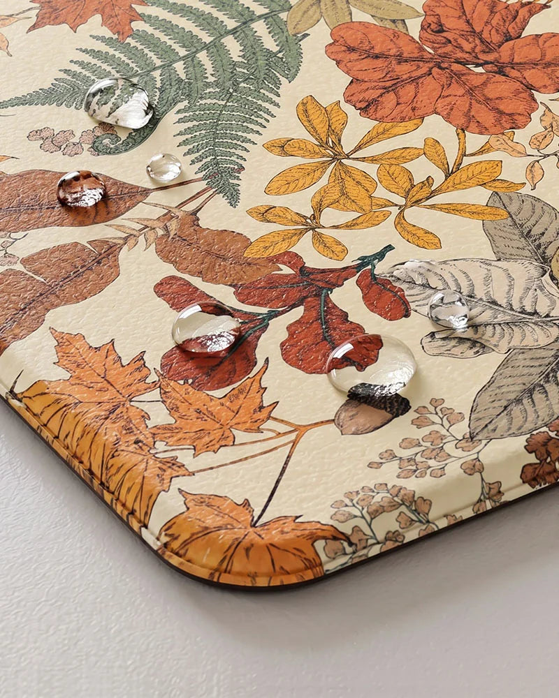 Maple Orange botanical kitchen mat close-up with water-resistant cushioned surface