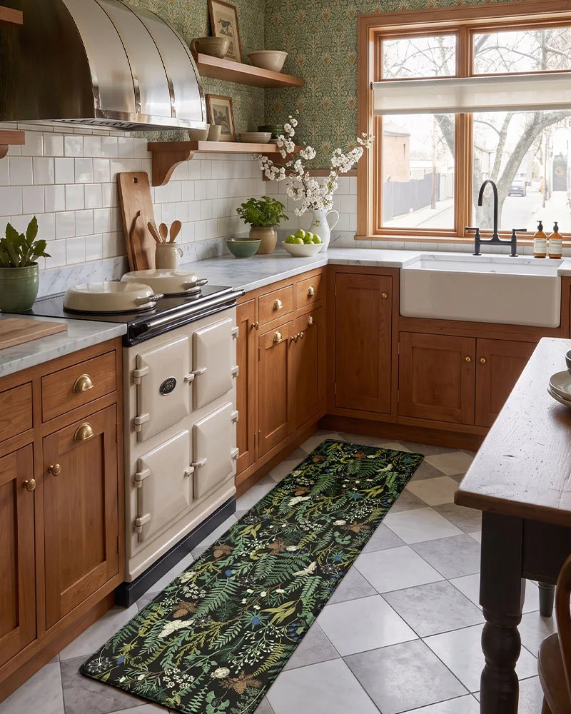 Ink Moss Green botanical kitchen runner beside wood cabinets and a farmhouse sink