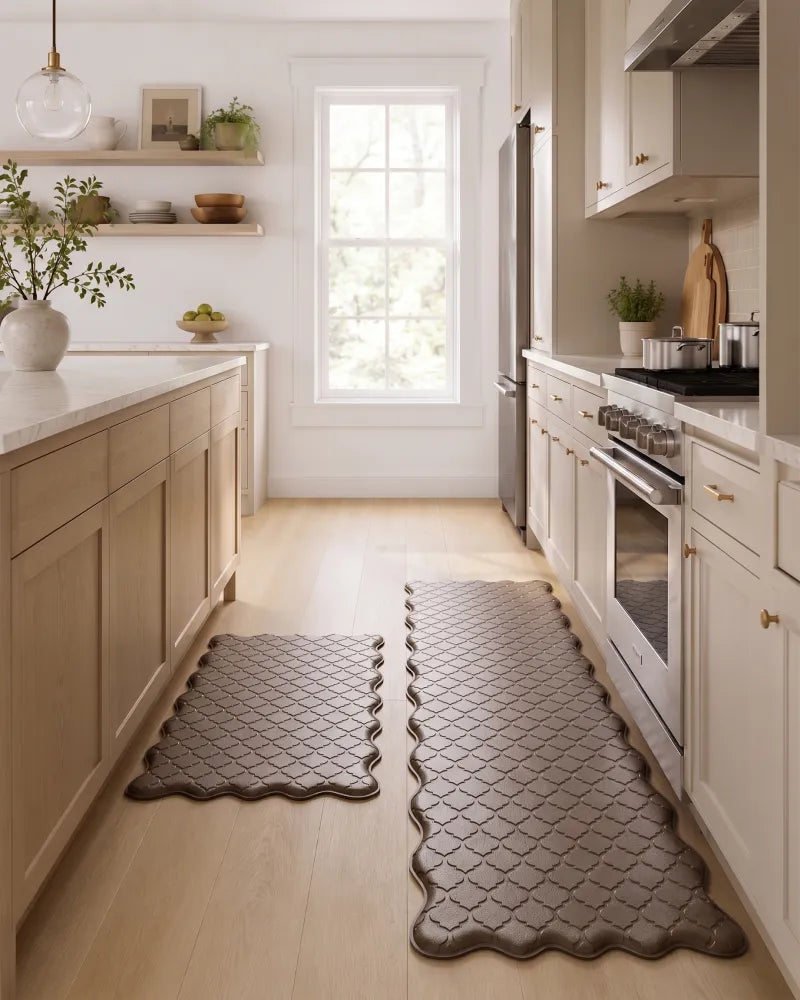 Brown scalloped anti-fatigue kitchen mat set in a modern farmhouse kitchen with white cabinets