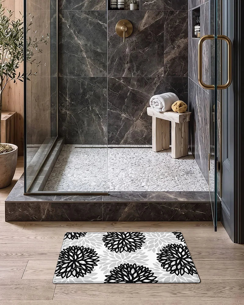 Black Gray dahlia floral anti-fatigue kitchen mat set in a modern bathroom shower area