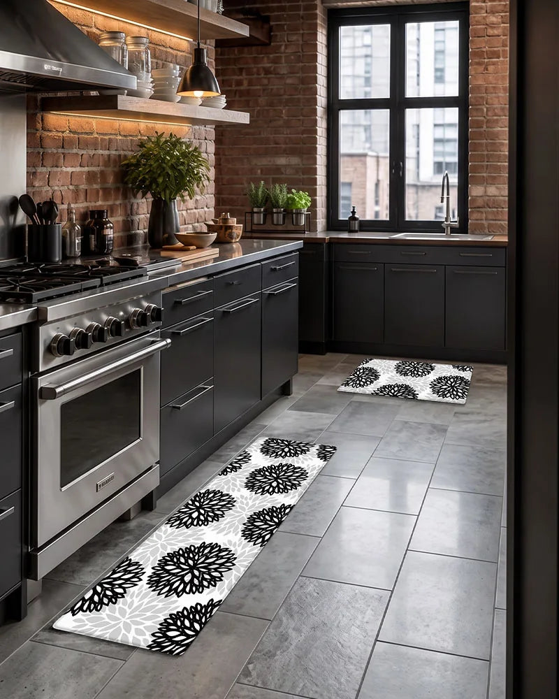Black Gray dahlia floral anti-fatigue kitchen mat set in a dark industrial kitchen