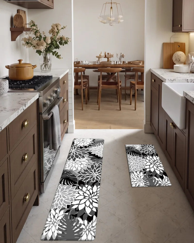 Black White floral kitchen runner and matching mat in a warm galley kitchen
