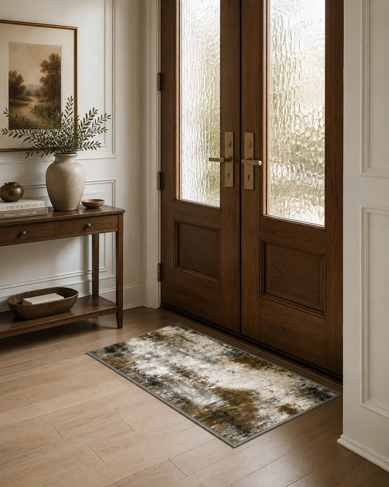 gray brown washable abstract foyer rug beside wood double doors