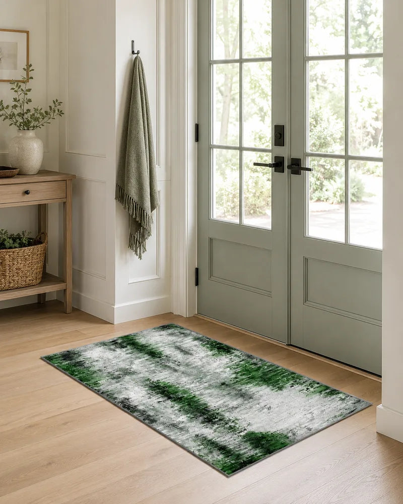 Gray green non-slip abstract foyer rug beside glass doors