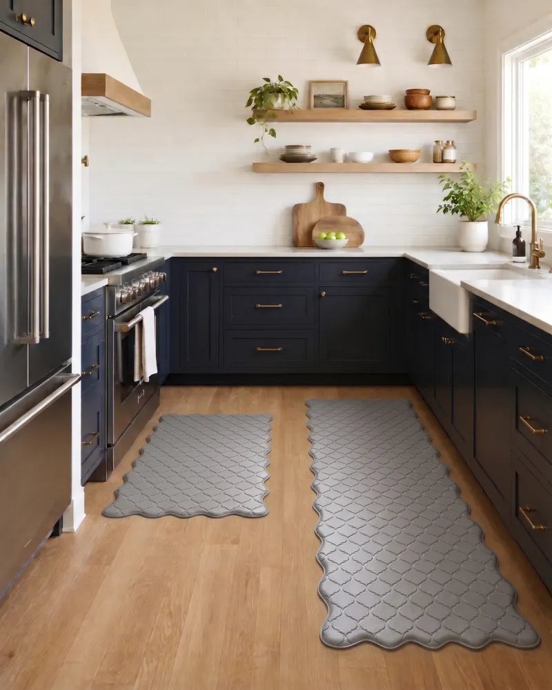 Gray scalloped anti-fatigue kitchen mat set in a modern blue kitchen