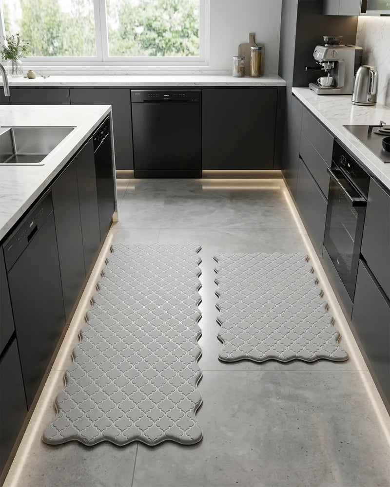 Gray scalloped anti-fatigue kitchen mat set in a galley kitchen