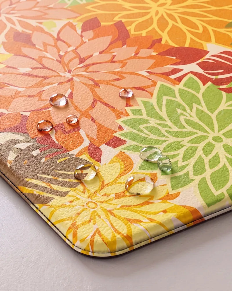 Water droplets on Maple Orange floral anti-fatigue kitchen mat showing its waterproof surface