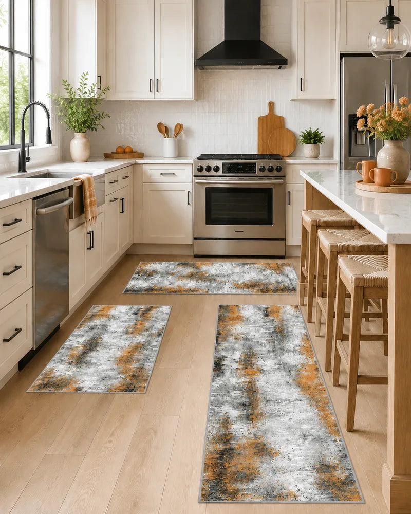 Orange abstract kitchen rug set in a bright kitchen with white cabinets