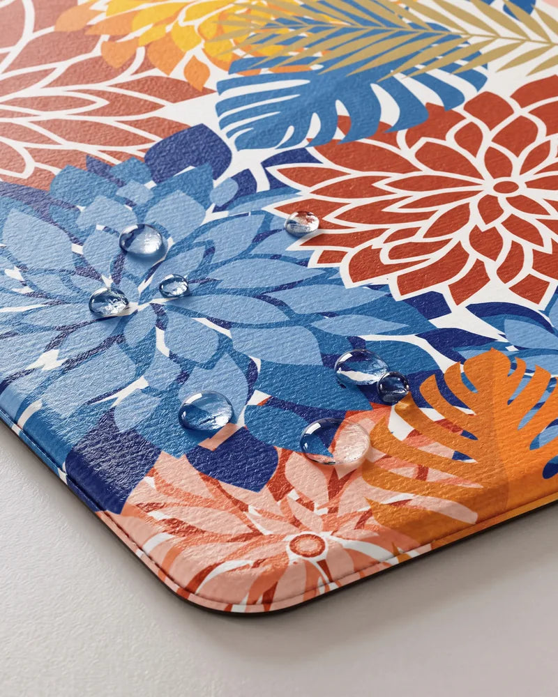 Water droplets on Red Blue floral anti-fatigue kitchen mat showing its waterproof surface