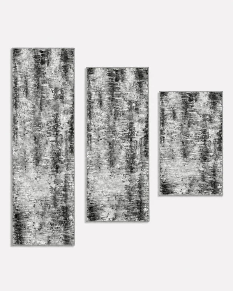 Gray washable non-slip kitchen rug set of three, shown longest to shortest: 20 x 59, 20 x 48, and 20 x 32 inches