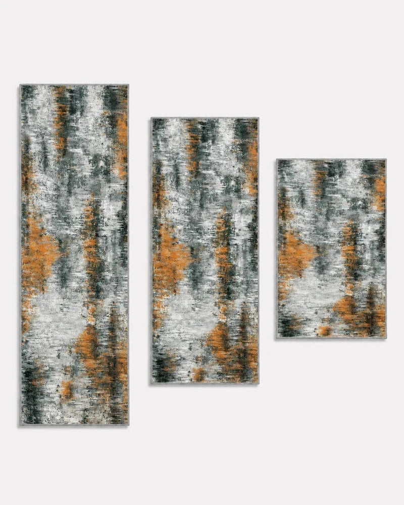 Orange washable non-slip kitchen rug set of three, shown longest to shortest: 20 x 59, 20 x 48, and 20 x 32 inches