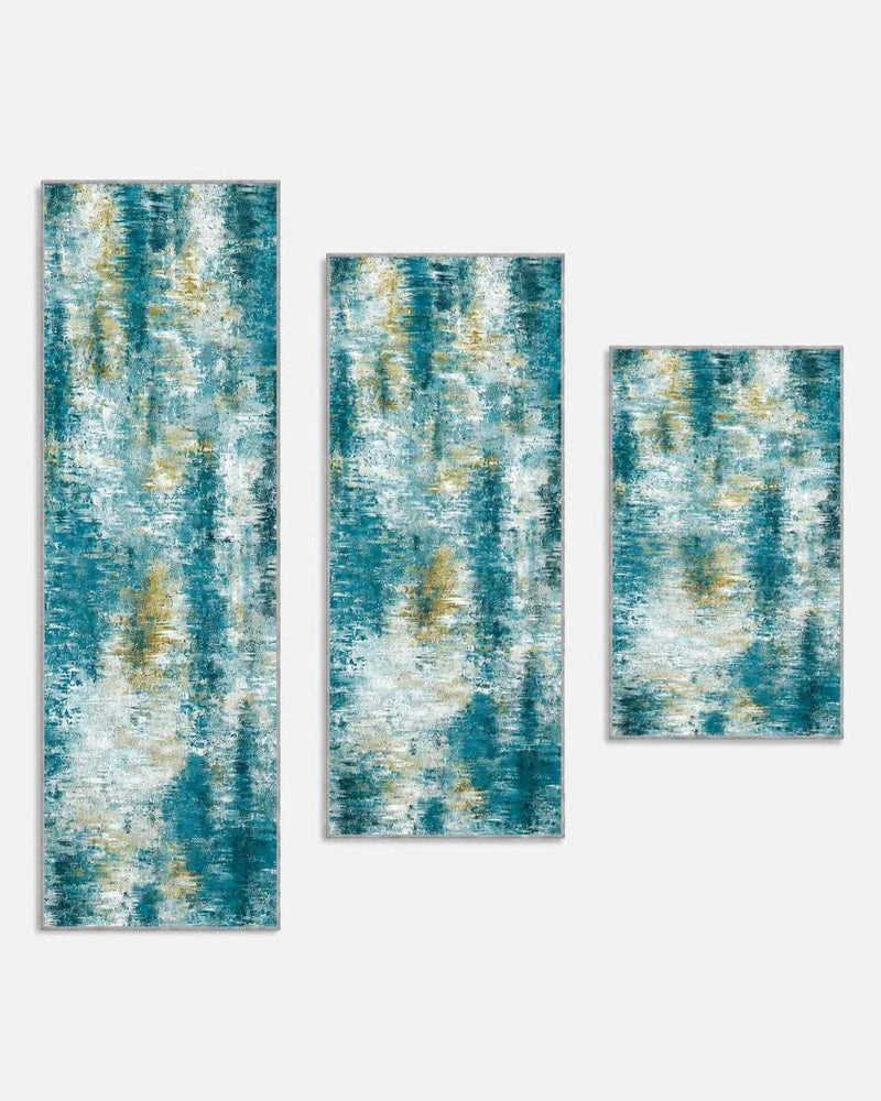 Teal washable non-slip kitchen rug set of three, shown longest to shortest: 20 x 59, 20 x 48, and 20 x 32 inches