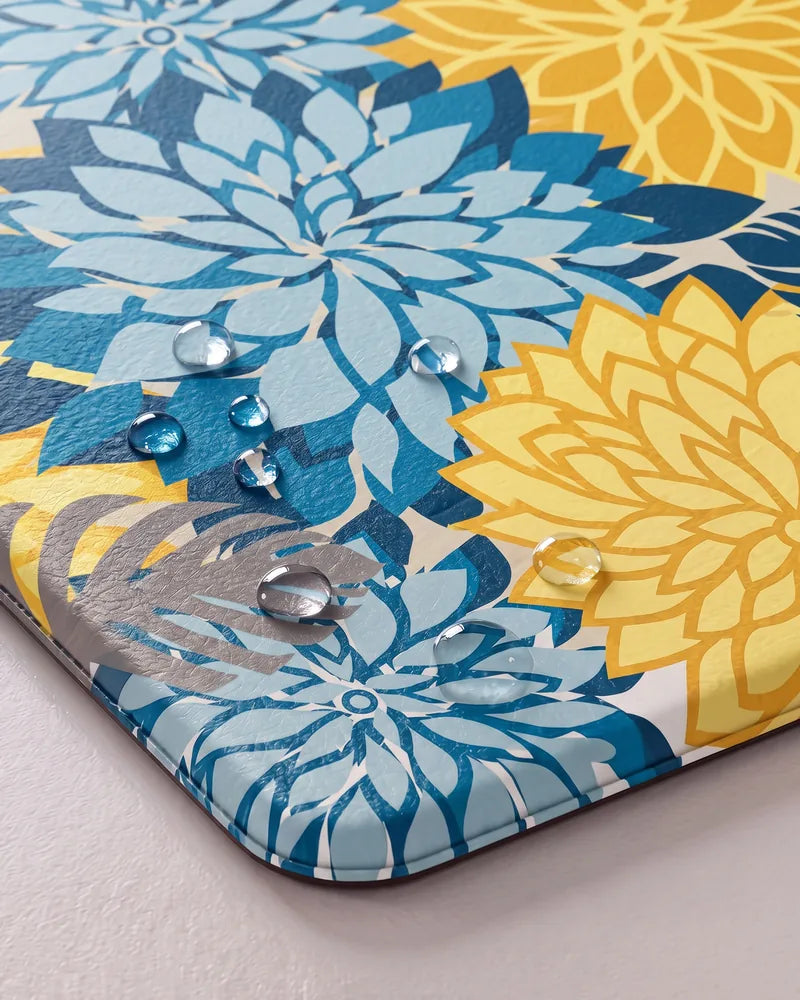 Water droplets on Yellow Teal floral anti-fatigue kitchen mat showing its waterproof surface